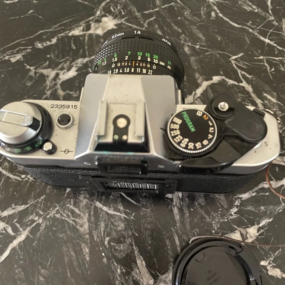 Canon AE-1 Black and Silver Film Camera with Flash 188A